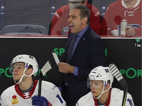 Laval Rocket coach Joël Bouchard yells at players during AHL game at Place Bell in Laval on Oct. 12, 2018.
