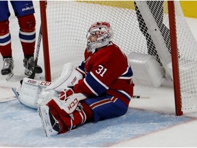 Canadiens goalie Carey Price takes a breather after making a save against the Lightning Tuesday night at the Bell Centre.