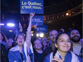 Bloc Québécois supporters watch election results at Montreal's Le National theatre on Monday.