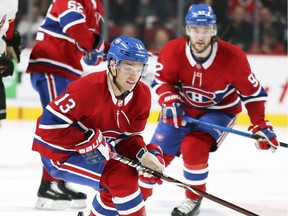 Montreal Canadiens' Max Domi in action with Jonathan Drouin against the Calgary Flames in Montreal on Oct. 23, 2018.