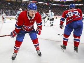 Montreal Canadiens' Brendan Gallagher pauses before heading to the bench with teammate Jonathen Drouin during first period against the San Jose Sharks in Montreal on Oct. 24, 2019.