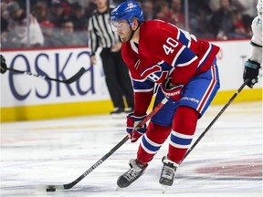Montreal Canadiens' Joel Armia looks to pass the puck during third period against the San Jose Sharks in Montreal on Oct. 24, 2019.
