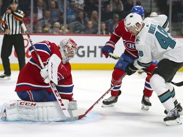 Montreal Canadiens Carey Price makes stop in front of San Jose Sharks Tomas Hertl during second period of National Hockey League game in Montreal Thursday October 24, 2019.