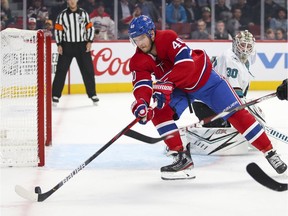 Montreal Canadiens Joel Armia can't control the puck next to the open net of San Jose Sharks goalie Aaron Dell during first period of National Hockey League game in Montreal Thursday October 24, 2019.