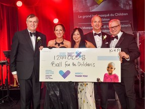 MUHC president Dr. Pierre Gfeller, MCHF president Renée Vézina, MCHF chair Katrin Nakashima, and ball co-presidents André Beaulieu and Joseph Broccolini show off the goods at their Ball for the Children’s.