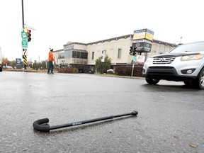A cane is seen in the middle of the intersection at Armand Bombardier and Maurice Duplessis Blvds. where a pedestrian was stuck by a car  on Thursday, Oct. 31, 2019. It is not known if the cane belonged to the victim.
