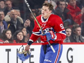 Canadiens defenceman Noah Juulsen heads to the bench after taking a puck to the face during NHL game against the Washington Capitals at the Bell Centre in Montreal on Nov. 19, 2018.