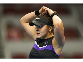 Bianca Andreescu of Canada reacts during the match against Naomi Osaka of Japan during the Women's singles Quarter Finals of 2019 China Open at the China National Tennis Center on Friday, Oct. 4, 2019, in Beijing.