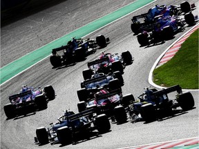 A general view of the start showing Pierre Gasly of France driving the (10) Scuderia Toro Rosso STR14 Honda leading Lance Stroll of Canada driving the (18) Racing Point RP19 Mercedes during the F1 Grand Prix of Japan at Suzuka Circuit on Sunday, Oct. 13, 2019, in Suzuka, Japan.