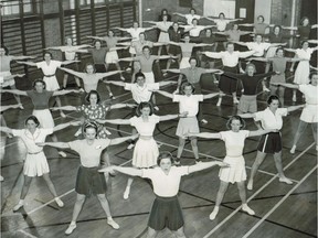 1940 Headline "Military nurses at PT" Nov. 8, 1940. Now mobilized for active service, 50 nursing sisters of the Royal Canadian Army Corps who are practically all from Montreal have begun physical training at the YWCA on Dorchester St. W. under trained instructors. The photo shows the nurses at one of their exercises yesterday. The sisters belong to No. 1 General Hospital, Canadian Active Service Force, which is now overseas under the command of Col. A.E. Lundon, ED.