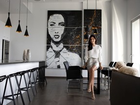 Kim Bruneau in the open-plan living area of her Montreal penthouse.