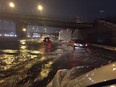 Parts of Highway 20 flooded during a torrential thunderstorm in Montreal Oct. 1, 2019.