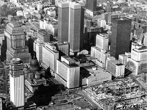 An aerial view of part of downtown Montreal published in the Montreal Gazette Oct. 19, 1965 shows the Chateau Champlain (front left) and Place Bonaventure (front right) under construction.