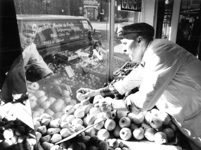 Simcha Leibovich ran a fruit market on St-Laurent Blvd. for 40 years. This photo was published on Oct. 23, 1986 to illustrate a feature on the changing face of the Main.