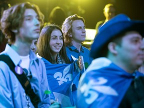 Bloc Québécois supporters watch results of the Oct. 21 federal election. Many Quebecers voted for the Bloc "because no other party offered safe haven for their national character," Lise Ravary writes.