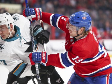 Montreal Canadiens Max Domi gets his stick up on San Jose Sharks Dylan Gambrell during third period of National Hockey League game in Montreal Thursday October 24, 2019.