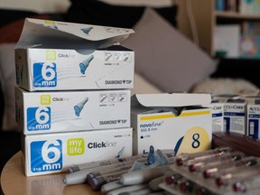 Medical paraphernalia including test strips to measure blood sugar and needles and vials of insulin belonging to David Burns, 38, who has type 1 diabetes, are photographed in his home in North London on February 24, 2019. Diabetics and insulin providers in Britain are stockpiling their precious medicine to avoid potential shortages in case Britain leaves the European Union without a deal.