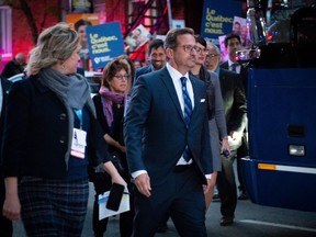 Bloc Québécois Leader Yves-François Blanchet (R) arrives for the "Face-à-Face 2019" presented by TVA, in Montreal on October 2, 2019.