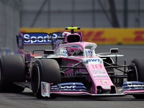 Racing Point's Canadian driver Lance Stroll powers his car during the F1 Mexico Grand Prix, at the Hermanos Rodriguez racetrack in Mexico City on Sunday, Oct. 27, 2019.  Her finished the race in 12th place.