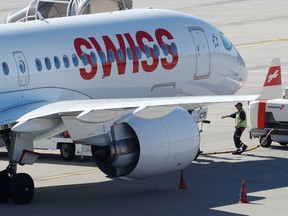 An Airbus A220 jet of Swiss Airlines is seen at Zurich airport in Zurich, Switzerland October 16, 2019.  REUTERS/Arnd Wiegmann