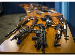 Toronto Police display some of the guns acquired following a gun buyback program earlier this summer.