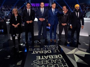 Green Party leader Elizabeth May, Liberal leader Justin Trudeau, Conservative leader Andrew Scheer, People's Party of Canada leader Maxime Bernier, Bloc Quebecois leader Yves-Francois Blanchet and NDP leader Jagmeet Singh, pose for a photograph before the Federal leaders debate in Gatineau, Quebec, Canada October 7, 2019.