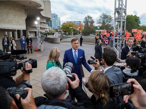 People's Party of Canada leader Maxime Bernier talks to the news media in Gatineau last week. Journalists should be particularly concerned about new rules which criminalize the distribution of “fake news” during an election campaign.