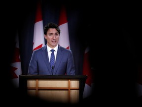 Prime Minister Justin Trudeau speaks to the news media for the first time since winning a minority government in the federal election, at the National Press Theatre in Ottawa, Ontario, Canada October 23, 2019.