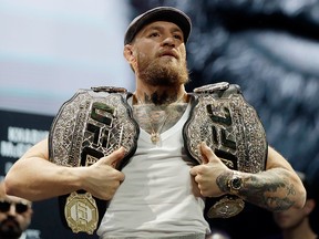 Conor McGregor poses for cameras following a press conference for UFC 229 at Park Theater at Park MGM on Oc. 3, 2018, in Las Vegas.