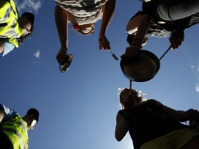 Casserole protesters bang pots in an attempt to disrupt Canadian Formula One Grand Prix festivities in downtown Montreal in June 2012.