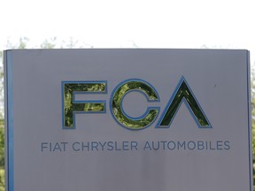 A Fiat Chrysler Automobiles sign is seen at the U.S. headquarters in Auburn Hills, Mich.  REUTERS/Rebecca Cook/File Photo