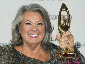 Ginette Reno holds up her award at the Gala Adisq awards ceremony in Montreal, Sunday, October 27, 2019.