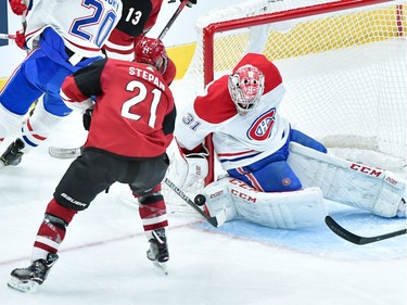 Canadiens goaltender Carey Price (31) makes a save on Arizona Coyotes center Derek Stepan (21) on Oct. 30. Habs won 4-1. Price made a total of 33 saves.