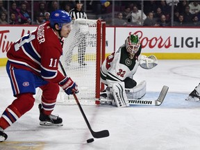 Canadiens forward Brendan Gallagher looks to pass the puck next to Wild goalie Alex Stalock Thursday night. Gallagher scored his third goal of the year in the third period.