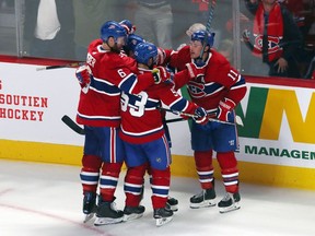 Canadiens' Brendan Gallagher (11) celebrates his goal against St. Louis Blues with teammates during the third period at the Bell Centre on Saturday, Oct. 12, 2019.