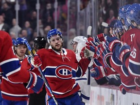 Canadiens' Jonathan Drouin reacts with teammates after scoring a goal against the Toronto Maple Leafs at the Bell Centre on Saturday, Oct. 26, 2019.