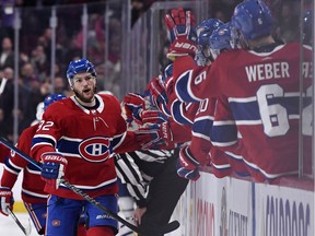 Montreal Canadiens forward Jonathan Drouin (92) reacts with teammates after scoring a goal against the Toronto Maple Leafs during the third period at the Bell Centre.