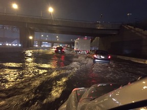 Flooding on Highway 20 after torrential thunderstorm hit Montreal.