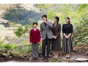 Japan's Prince Akishino (2nd L) and his wife Princess Kiko (2nd R) stroll in the garden for a family photo with their children Prince Hisahito (L) and Princess Mako, at their residence in Akasaka Imperial Grounds in Tokyo, Japan, in this handout photo taken November 4, 2017 and released by the Imperial Household Agency of Japan.