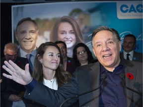 Quebec Premier Francois Legault , right, introduces Jean-Talon riding Coalition Avenir Quebec candidate Joelle Boutin, left, at a nomination meeting, Sunday October 27, 2019 in Quebec City. A byelection will be held on Dec. 2 in the riding.
