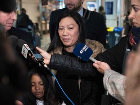 Vanessa Rodel (C) and her daughter, Keana Rodel bottom (L), face the press as they arrive at Pierre Elliott Trudeau International Airport in Montreal, on March 26, 2019.