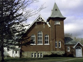 A central icon in Hudson, the Wyman Memorial Church is up for sale.