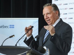 "When we go into a shop in Montreal, we should insist on being served in French," says Premier François Legault, seen in a file photo.