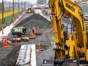 REM construction continues at the site near where Highway 40 overpasses the train tracks in Montreal Sept. 23, 2019.