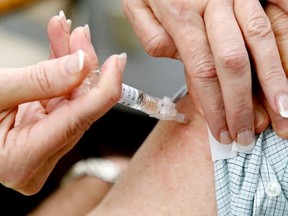 The flu vaccine — which this year protects against four strains instead of the usual three — is in short supply, so distribution has been limited to those who need it.