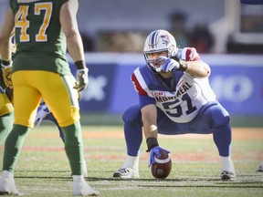 Montreal Alouettes centre Kristian Matte calls out blocking assignments against the Edmonton Eskimos at Molson Stadium on Oct. 10, 2016.