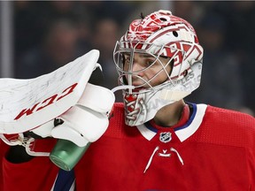 Canadiens goalie Carey Price takes a water break during second period of NHL game against the San Jose Sharks at the Bell Centre in Montreal on Oct. 24, 2019.