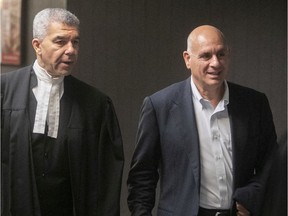 Witness Riadh Ben Aissa, right, with crown prosecutor Hans Gervais arrive for the start of the trial of former SNC-Lavallin Sami Bebawi on Thursday October 31, 2019.