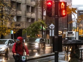 The city is getting flak for new bike traffic lights that forces cyclists to stop at every second intersection like de-Maisonneuve Boulevard at Saint-Mathieu Street in Montreal on Thursday October 31, 2019. Dave Sidaway / Montreal Gazette ORG XMIT: 63397