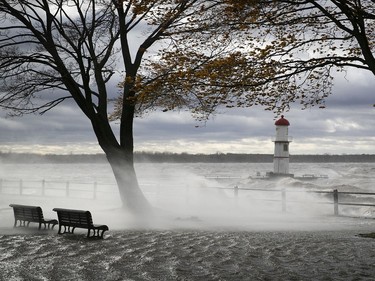 Waves hit the lighthouse in Lachine during the wind storm on Friday, Nov. 1, 2019.